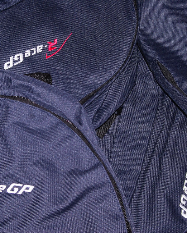 Sacs à dos bleu marine, logo brodé, Broderie sur devis, R-ace GP, atelier Antistatik à Toulouse